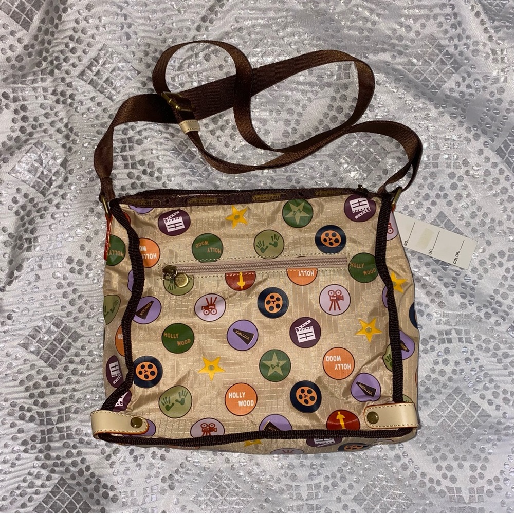 Cross body bag hollywood logo adjustable strap outside pockets